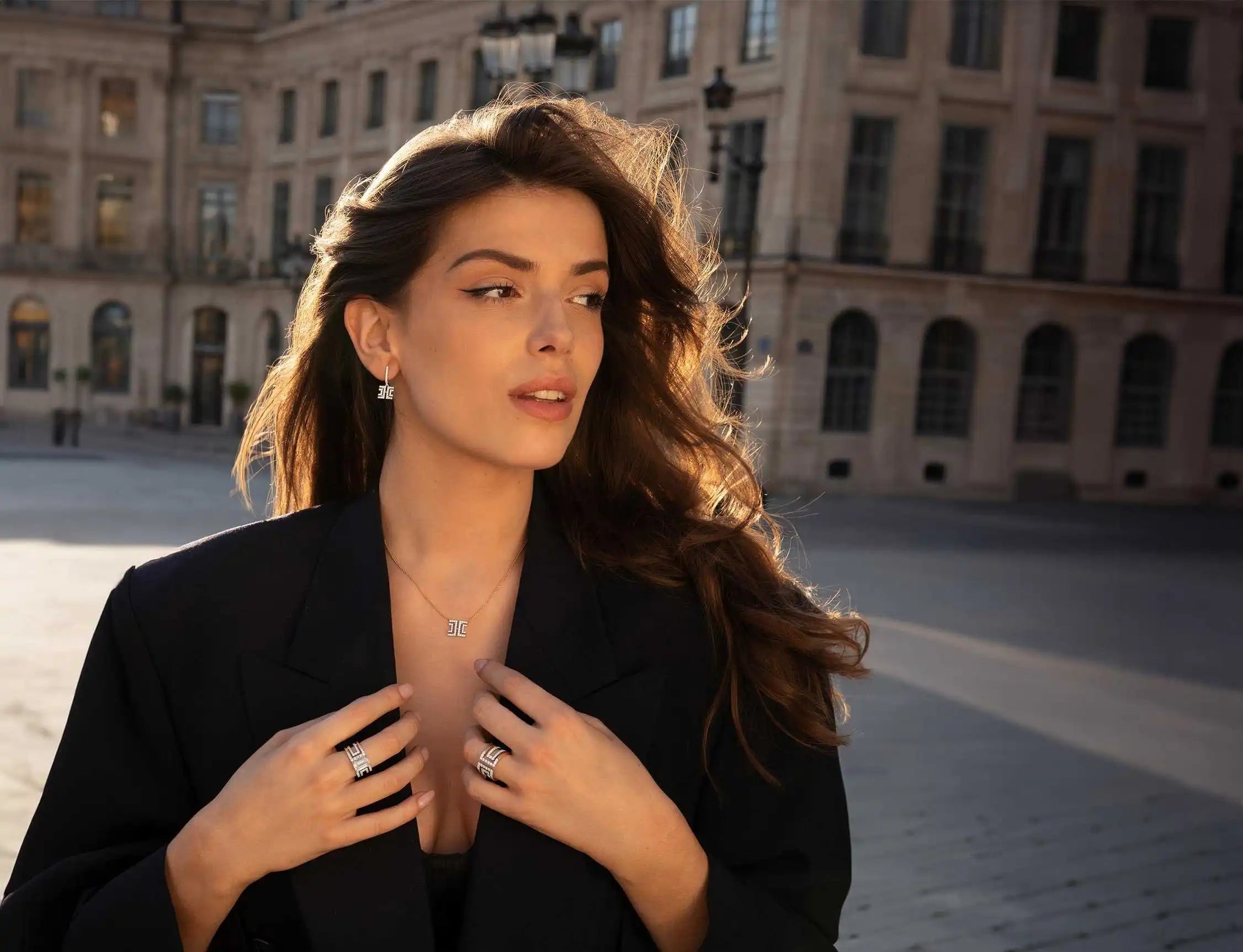 Model posing in place de Vendome in Paris wearing the Entre-Deux collection.